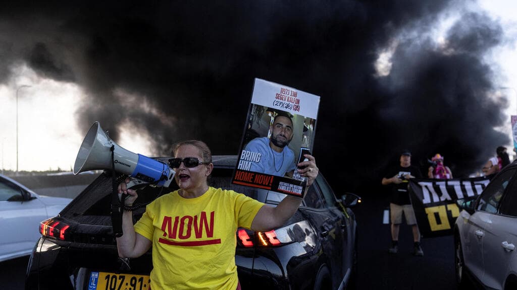 צילום: REUTERS/Nir Elias מחאה ליד יקום