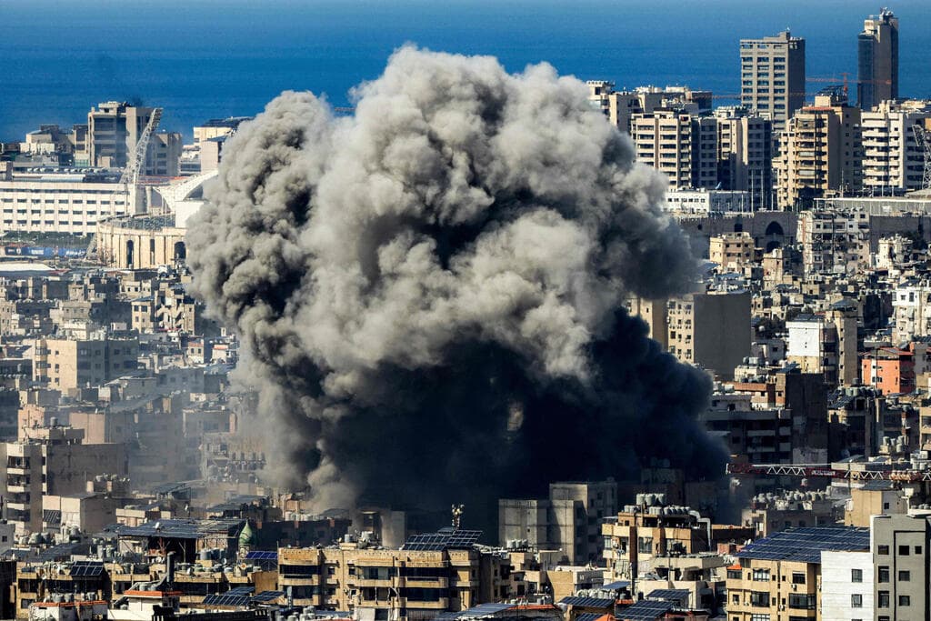 צילום: Ibrahim AMRO / AFP תקיפה בדאחייה