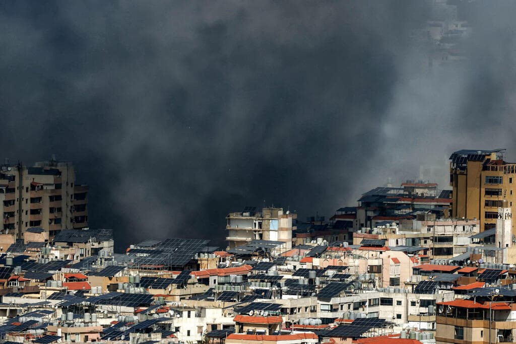צילום: IBRAHIM AMRO / AFP תקיפה בדאחייה