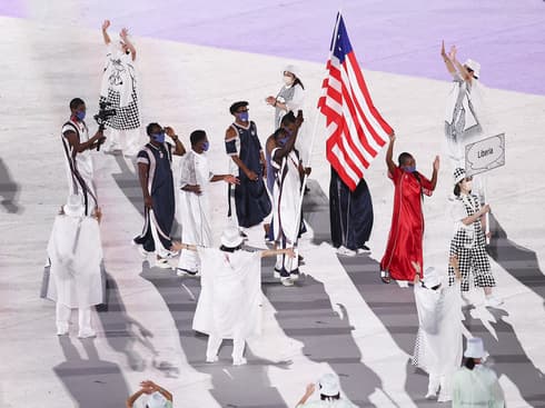 בגדים ללא מגדר. נבחרת ליבריה בטקס הפתיחה של האולימפיאדה