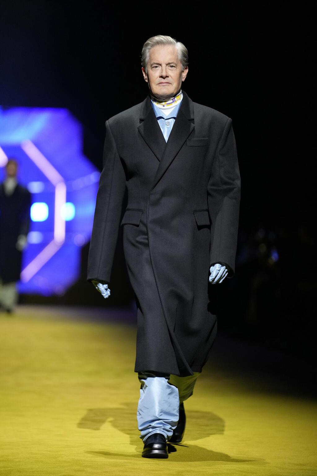 קייל מקלכלן בתצוגת האופנה של פראדה