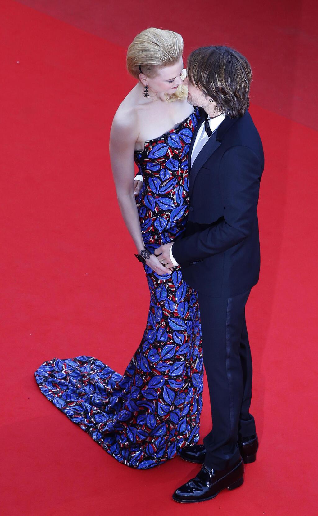 קידמן וקית' אורבן בפסטיבל קאן, 2013 (צילום: AP Photo/Yves Herman) ניקול קידמן וקית' אורבן בפסטיבל קאן, 2013