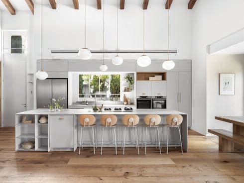 האי מהווה את הלב הפועם של המטבח, המצויד במוצרי החשמל היוקרתיים של ASKO בגוון בהיר 