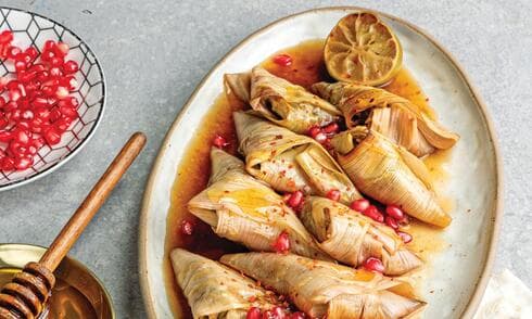 משולשי כרשה במלית בשר וברוטב רימונים