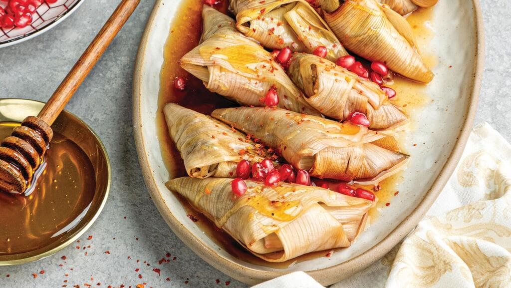 משולשי כרשה במלית בשר וברוטב רימונים