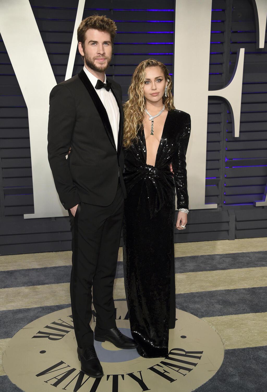 מיילי סיירוס וליאם המסוורת' במסיבת האוסקר של וניטי פייר, 2019