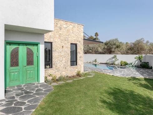 220 מ"ר שנבנה על מגרש של 406 מ"ר