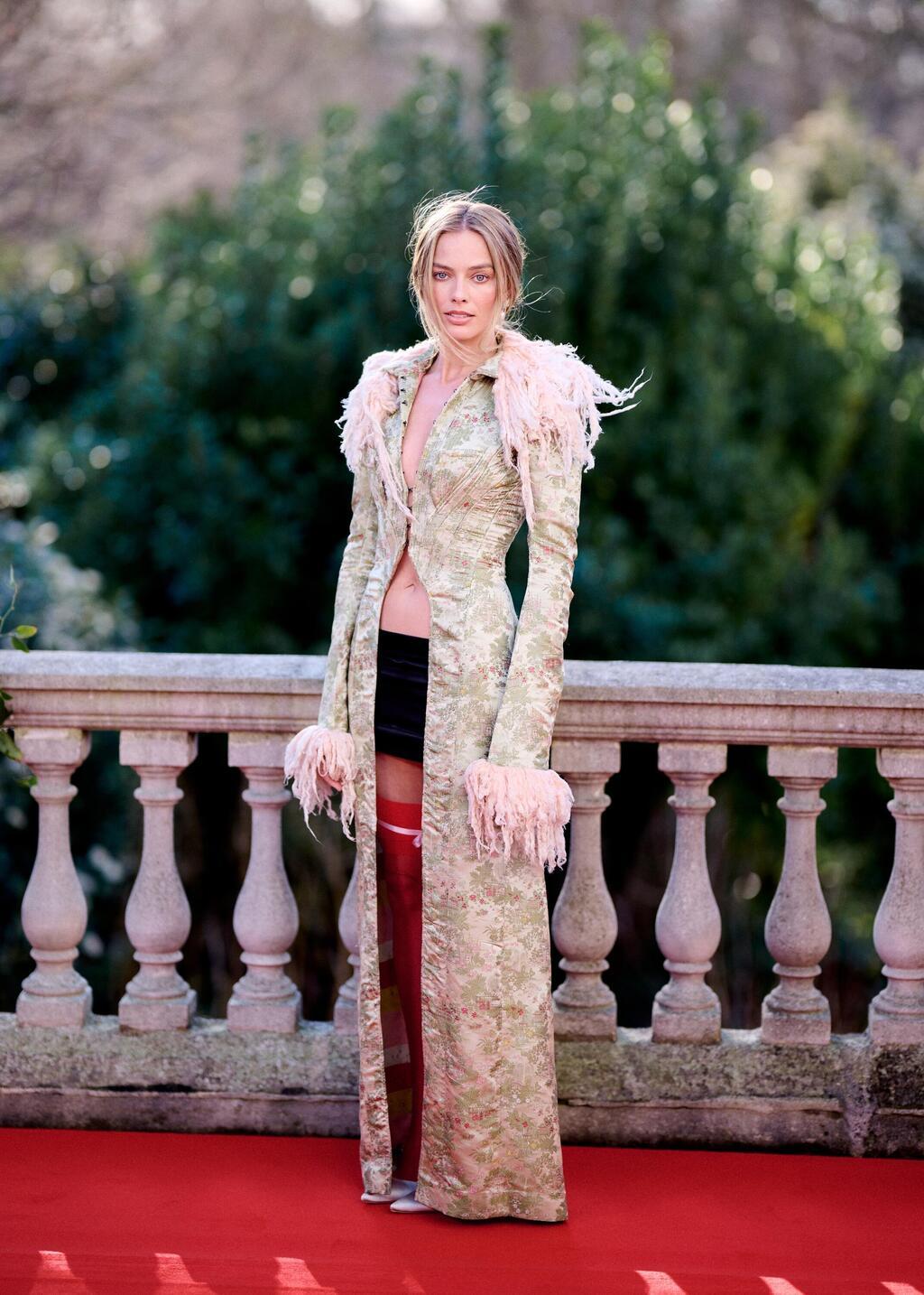 מרגו רובי בפרמיירה של "אנקת גבהים" בלונדון, 2026