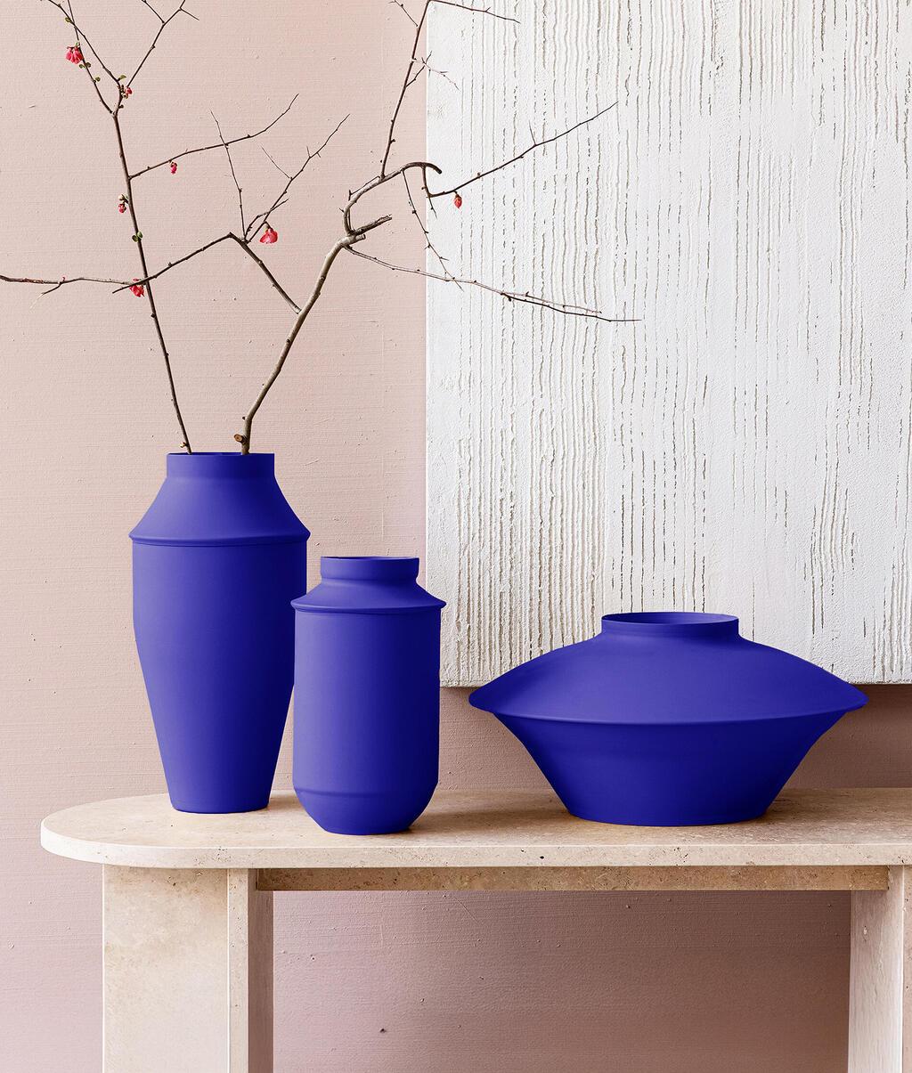 כדי מתכת בצבע כחול מרוקאי שהפך מזוהה עם מן והמותג