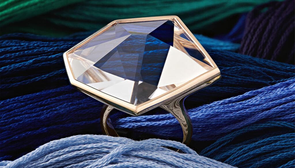 טבעת GRUPO CORPO בזהב אצילי 18 קראט ואבן קריסטל 