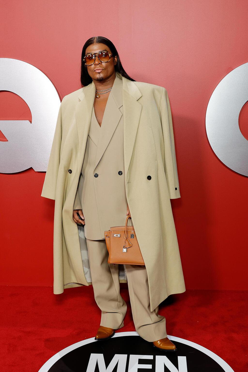 לאו רואץ' עם תיק של הרמס על השטיח האדום, 2023