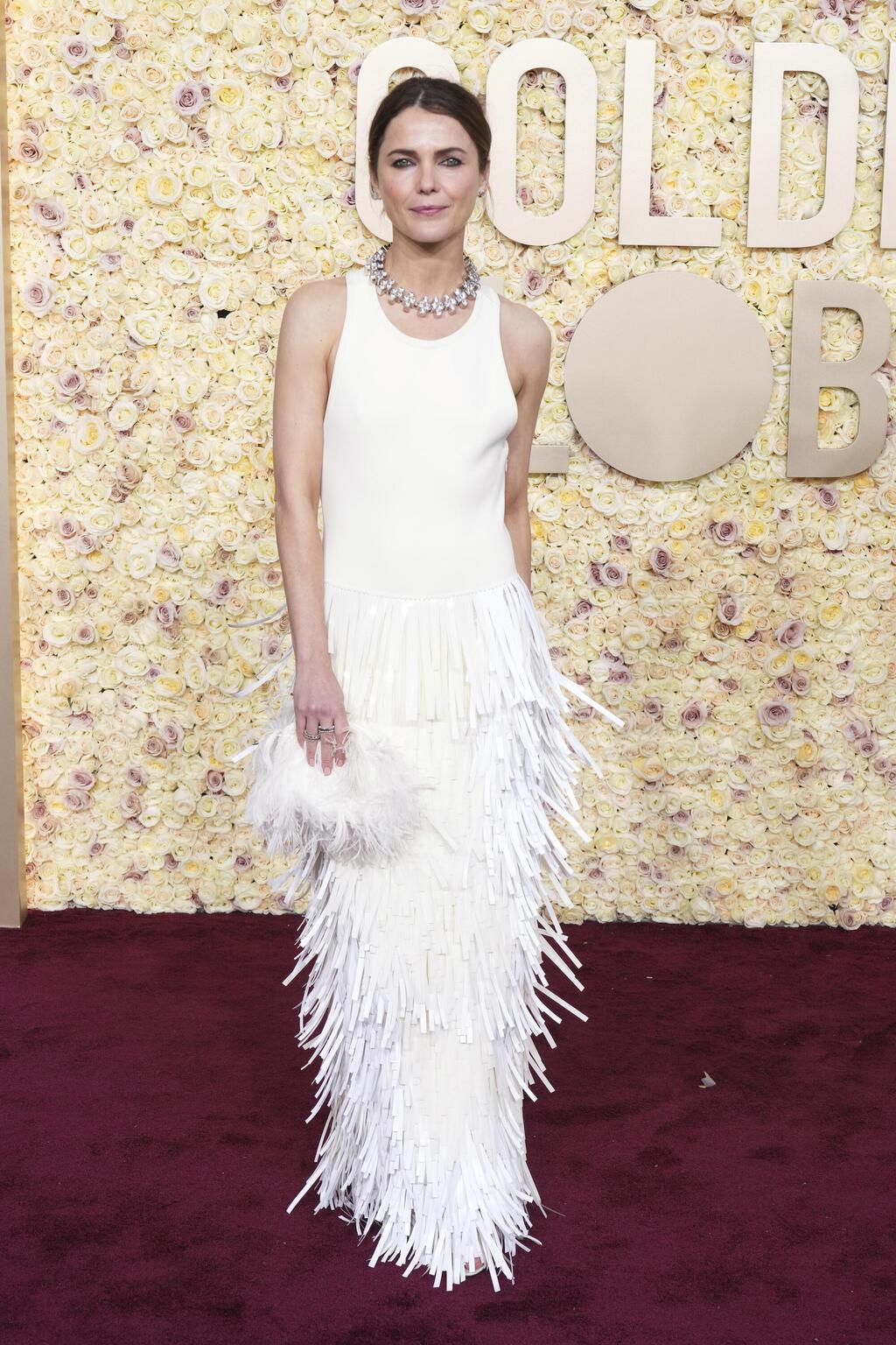 שמלה של ז'יל סנדר בטקס גלובוס הזהב, 2024 (צילום: Jordan Strauss/Invision/AP) קרי ראסל בטקס גלובוס הזהב, 2024