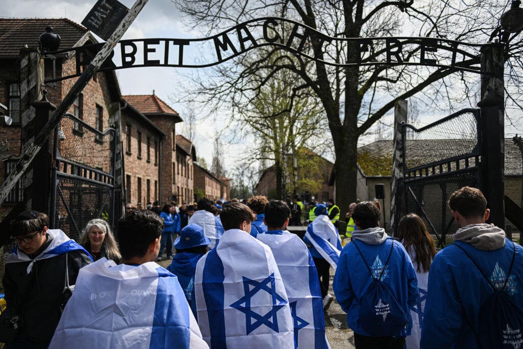 בני נוער ב"מצעד החיים", אושוויץ (צילום: Omar Marques/Getty Images) בני נוער ב"מצעד החיים", אושוויץ