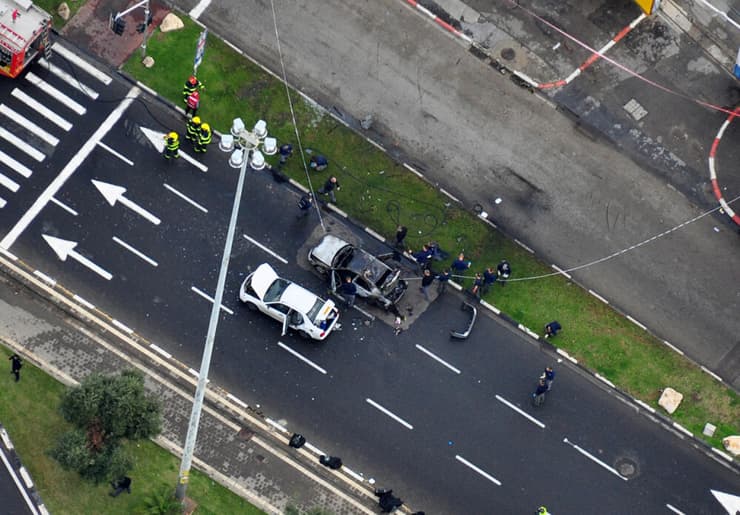 זירת הפיצוץ בת"א ב-2013. אלפרון תועד נמלט מהזירה