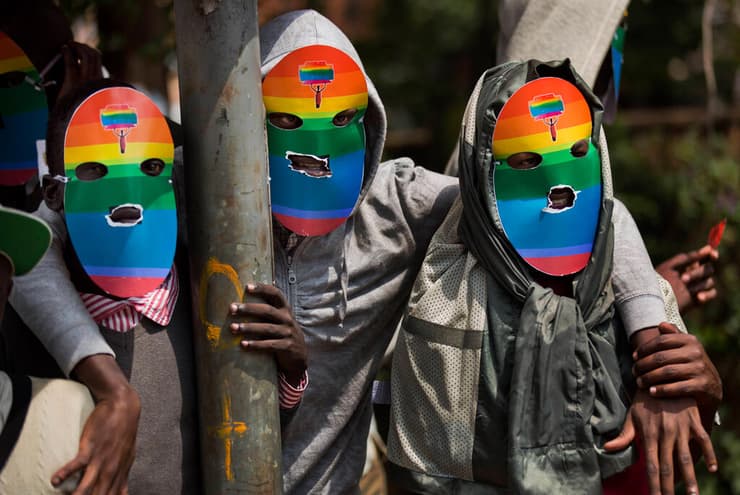 פעילים אפריקנים נגד רדיפת להט"ב. ברוב מדינות היבשת יחסים חד-מיניים אסורים בחוק