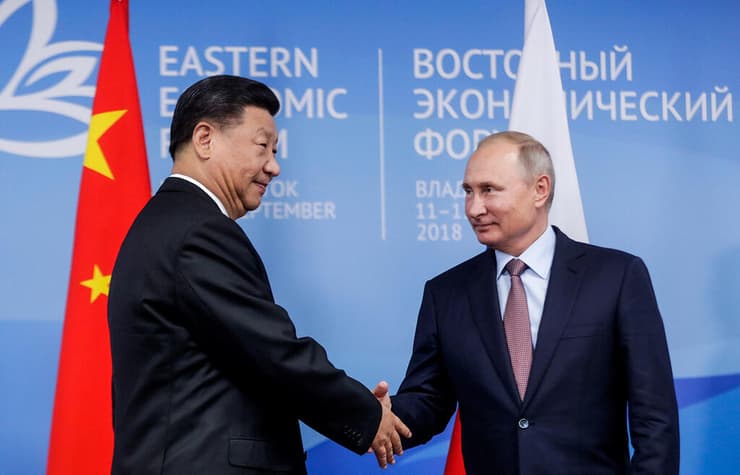 נשיא רוסיה ולדימיר פוטין עם נשיא סין שי ג'ינפינג 