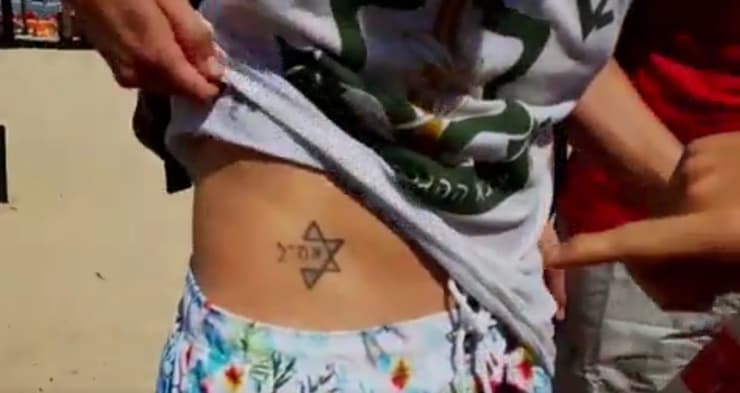 "עם ישראל חי", הקעקוע של אמיל השבדי והחצי יהודי התיירים משבדיה תיירים אירוויזיון חוף הילטון