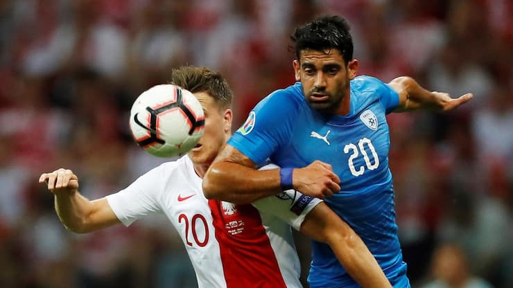 עמרי בן הרוש במאבק על כדור גובה