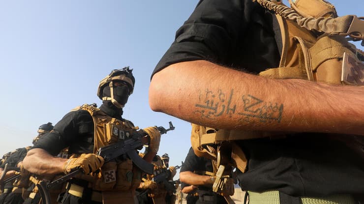 בצרה עיראק אל-חשד א-שעבי PMF מיליציות שיעיות הגיוס העממי