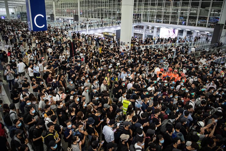 מהומות נמל תעופה הונג קונג סין