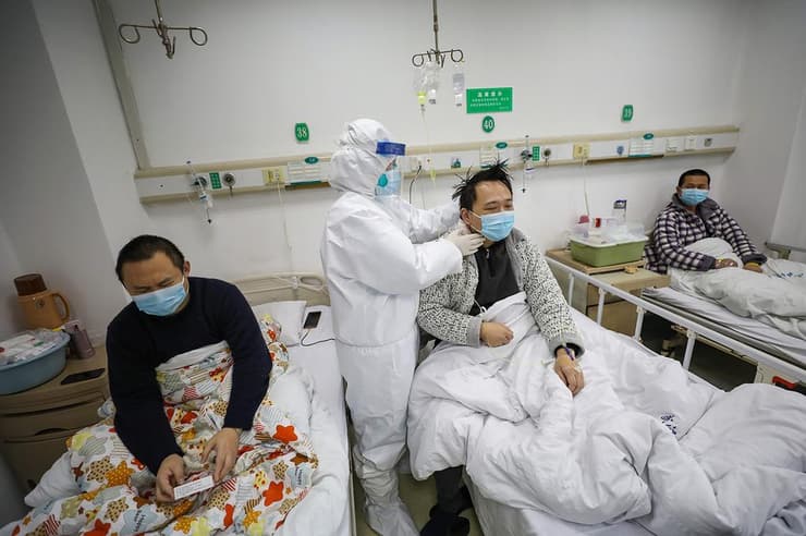 בית חולים רופאים מטפלים ב חולים נגיף קורונה ווהאן סין