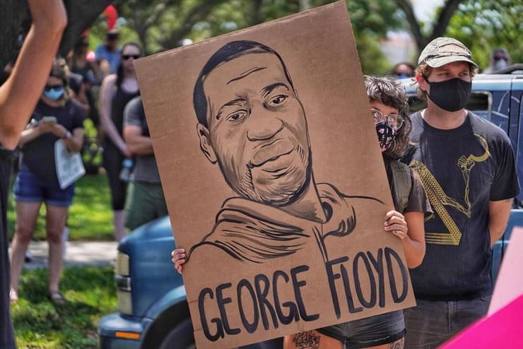 כרזת מחאה עם איור של ג'ורג' פלויד ב פלורידה מהומות ב ארה"ב