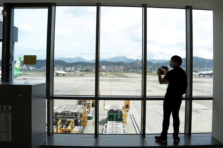 טייוואן סיור בנמל תעופה עם עלייה למטוס ימי קורונה