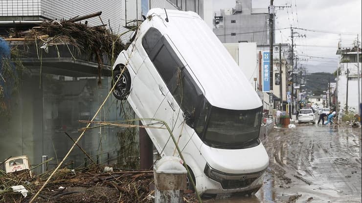יפן שיטפונות הצפות קומאמוטו האי קיושו