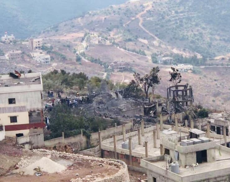 פיצוץ עין קאנא דרום לבנון אש עשן שריפה מבנים בניינים