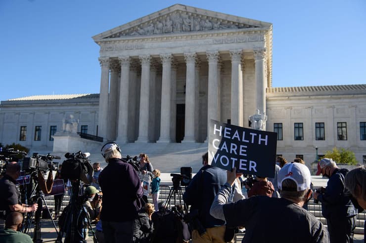  הפגנה נגד ביטול אובמה קר מחוץ לבית המשפט העליון ארה"ב