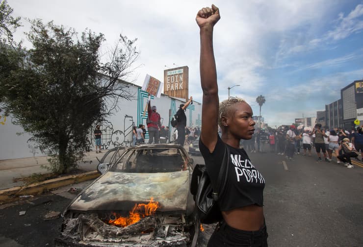 תמונות השנה בעולם של AP מפגינה במחאת ג'ורג' פלויד מיניאפוליס מאי