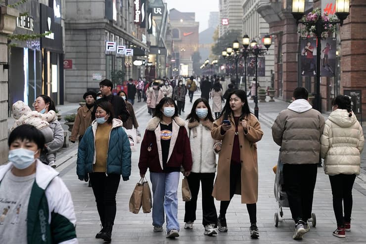 סין נגיף קורונה ווהאן עיר הנגיף שנה אחרי ההתפרצות