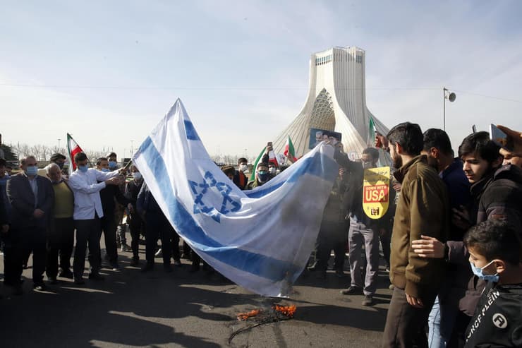 איראן 42 שנה ל מהפכה האיסלאמית שורפים דגל ישראל טהרן