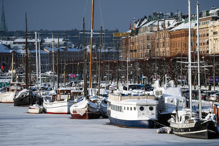 שבדיה שטוקהולם סטוקהולם שלג קרח נהר קפוא סירות