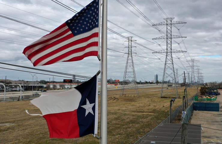 דגלי ארה"ב ו טקסס עמודי חשמל ב יוסטון