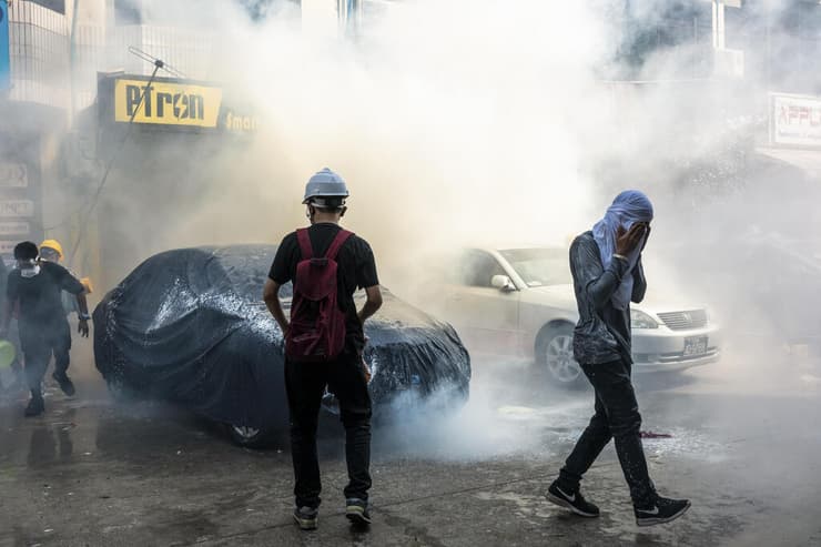 יאנגון מיאנמר מהומות הפגנה מפגינים עימותים עם שוטרים