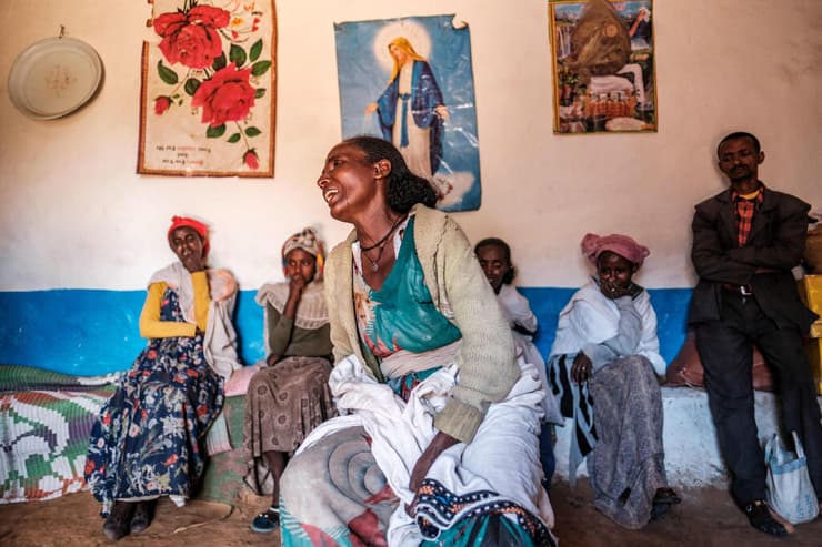 אתיופיה חשד ל פשעי מלחמה ב תיגראי כפר דנגולט תושבת ביינש טקליוהאנס