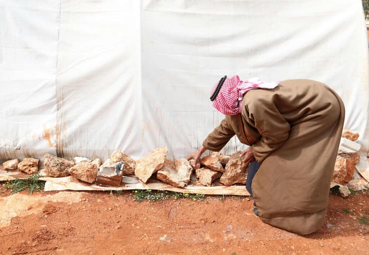 סוריה עבד א-ראזק חאתון איבד 13 ילדים מלחמת אזרחים 10 שנים למלחמה