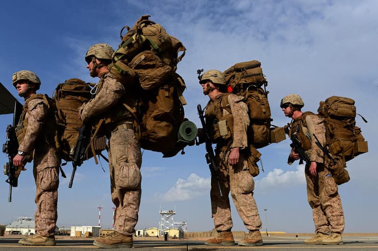 חיילים אמריקנים באפגניסטן ב-2014. משאירים מאחור 2,400 הרוגים   