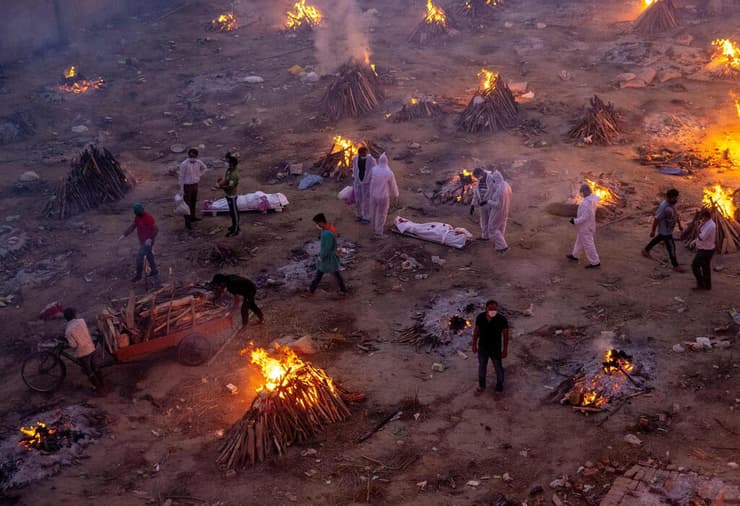 תמונה של צלם זוכה פוליצר דניש סידיקי נהרג ב אפגניסטן כאן שורפים גופות קורונה הודו 2021