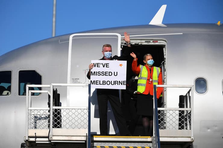 אוסטרליה נוסעים שנחתו ב נמל תעופה ב מלבורן אחרי הקלות בהגבלות קורונה על כניסה ויציאה מ אוסטרליה