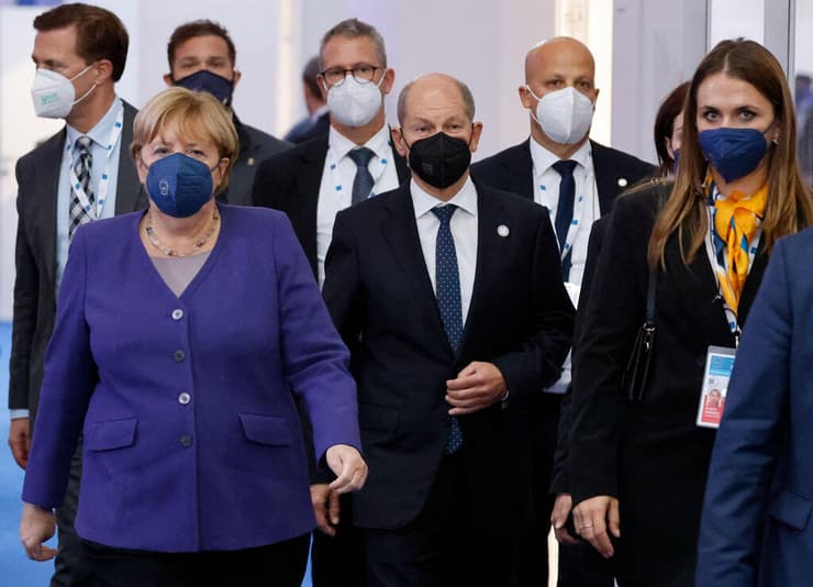 קנצלרית גרמניה אנגלה מרקל ועידת G20 עם ה קנצלר הבא אולף שולץ 