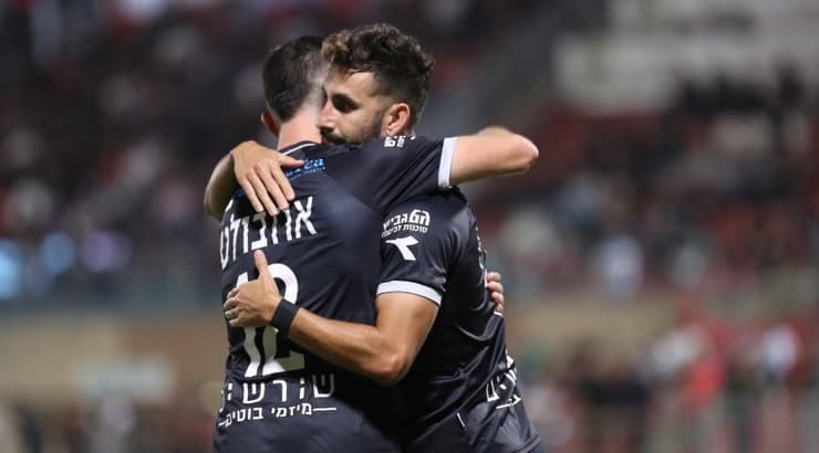 אלון תורג'מן ואלן אוז'בולט חוגגים