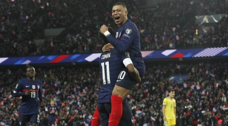 קיליאן אמבפה חוגג עם קינגסלי קומאן (רויטרס) קיליאן אמבפה חוגג עם קינגסלי קומאן