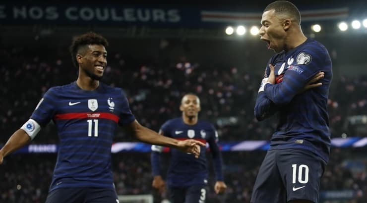 קיליאן אמבפה חוגג עם קינגסלי קומאן (רויטרס) קיליאן אמבפה חוגג עם קינגסלי קומאן