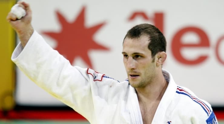 אלן שמיט בימיו כספורטאי (רויטרס) אלן שמיט בימיו כספורטאי