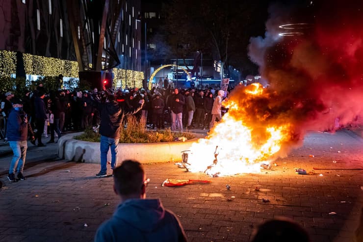 מהומות ב רוטרדם הולנד הפגנה נגד סגר חלקי
