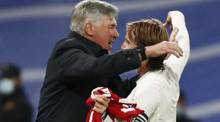 לוקה מודריץ' וקרלו אנצ'לוטי (רויטרס) לוקה מודריץ' וקרלו אנצ'לוטי