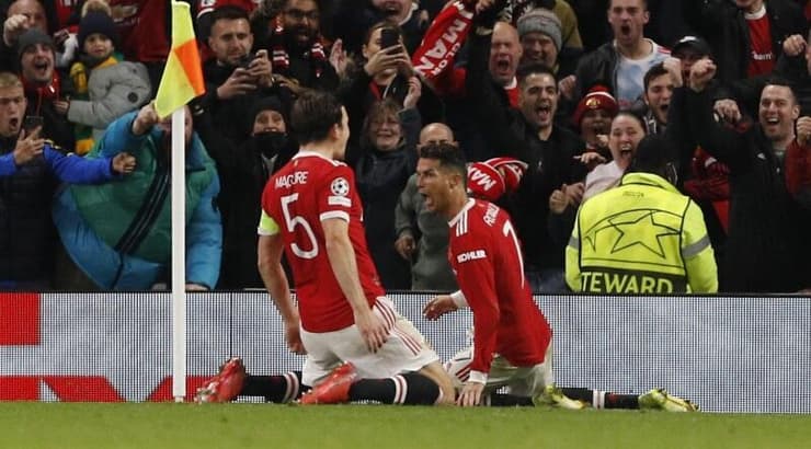 הארי מגווייר וכריסטיאנו רונלדו (רויטרס) הארי מגווייר וכריסטיאנו רונלדו