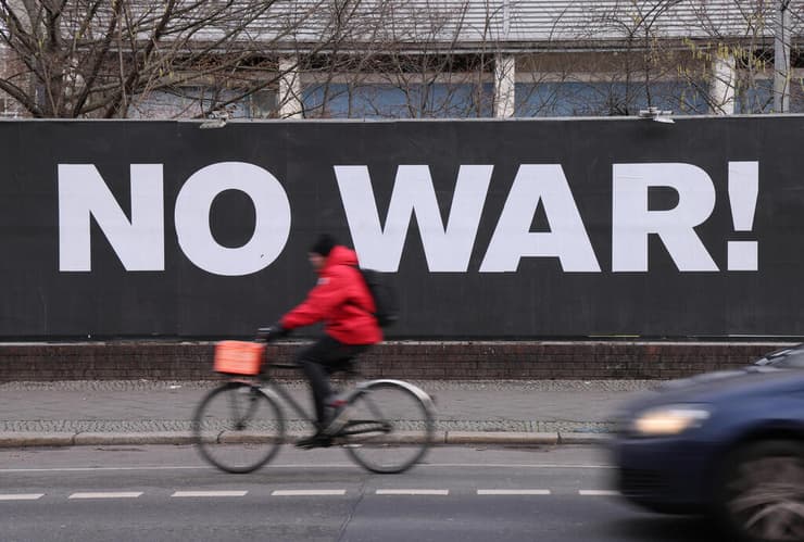 לא ל מלחמה שלט ב ברלין גרמניה מתיחות רוסיה אוקראינה